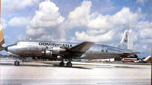 Dominicana DC6 Color post card with a type DC6 air plane from the airline Dominicana de Aviación. Dimension is 4 by 6.5 inches. Postal...