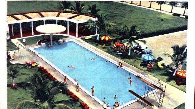Hotel Jaragua Color post card with a view of the pool of the Jaragua Hotel in the main ocean front avenue of Ciudad Trujillo....