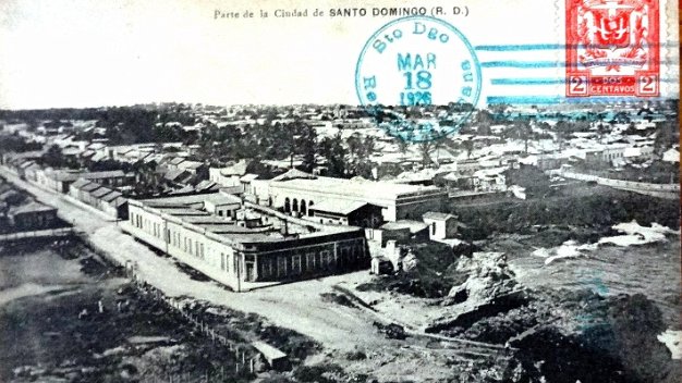 The City Black and white post card with a part of the city of San Domingo. Dimension is 3.5 by 5.5 inches. Postal en blanco y...